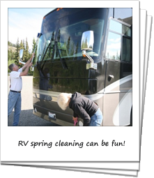 Couple spring cleaning an RV