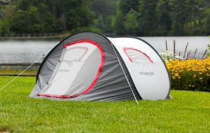 Self erecting tent pitched in front of a lake