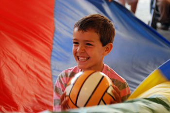 A child plays parachute