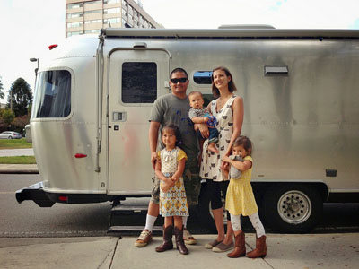 The Lin Family in front of Mali Mish; their Airstream trailer