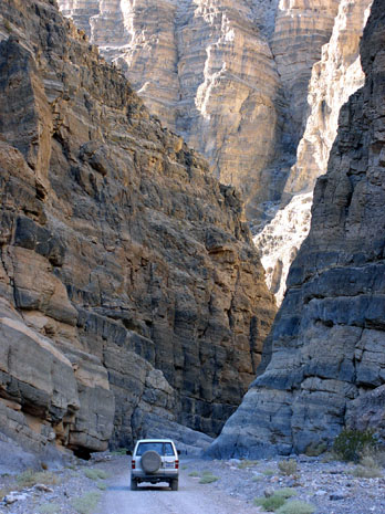 Vehicle driving through Titus Canyon, Death Valley National Park