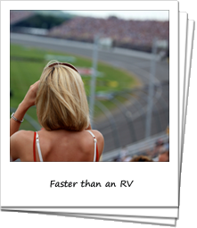 Lady fan watches the Superspeedway race