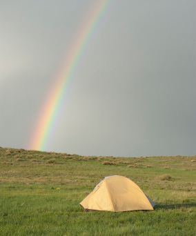 Rainbow over a tent