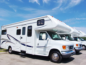 Line of parked class C motorhomes