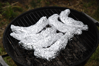 Bananas wrapped in foil on barbeque