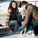 Young couple preparing to ice skate