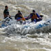 Couple whitewater rafting on the San Juan River, Colorado
