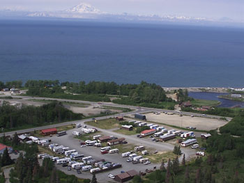 Aerial view of Alaskan Angler RV Resort with the sea in the background