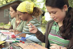 Girls doing crafts at camp