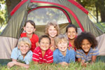 Group of children having fun in a tent