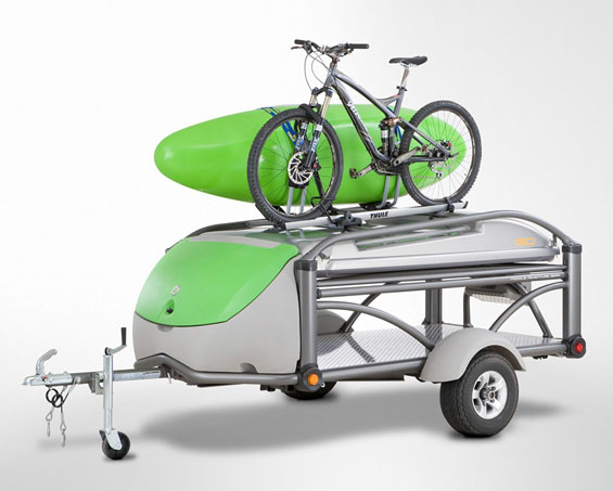 SylvanSport GO Camper Trailer with bike and canoe tied on top