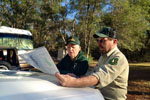 Brett Bush, Ocala National Forest Ranger studying a Forest Service Map
