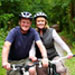 Mature couple on their bikes in the country