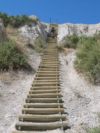 Climbing the ladder on Notch Trail, Badlands National Park