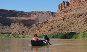 Woman rafting in the Desolation Canyon, Green River
