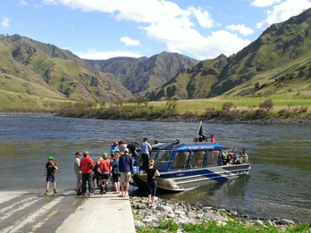 Group of people getting on a jetboat at Pittsburg Landing on the Snake River, ID