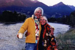 Becky Clarke and Maurrie Sussman standing by a lake