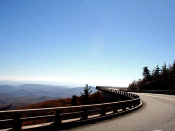 "S" shaped Linn Cove viaduct with Blue Ridge mountain in the background