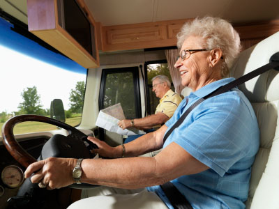 Senior woman driving an RV