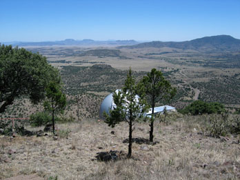 Telescope dome at McDonalds Observatory with scenic desert background